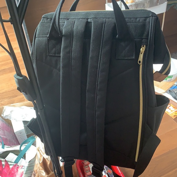 Black wide opening backpack - Picture 2 of 3